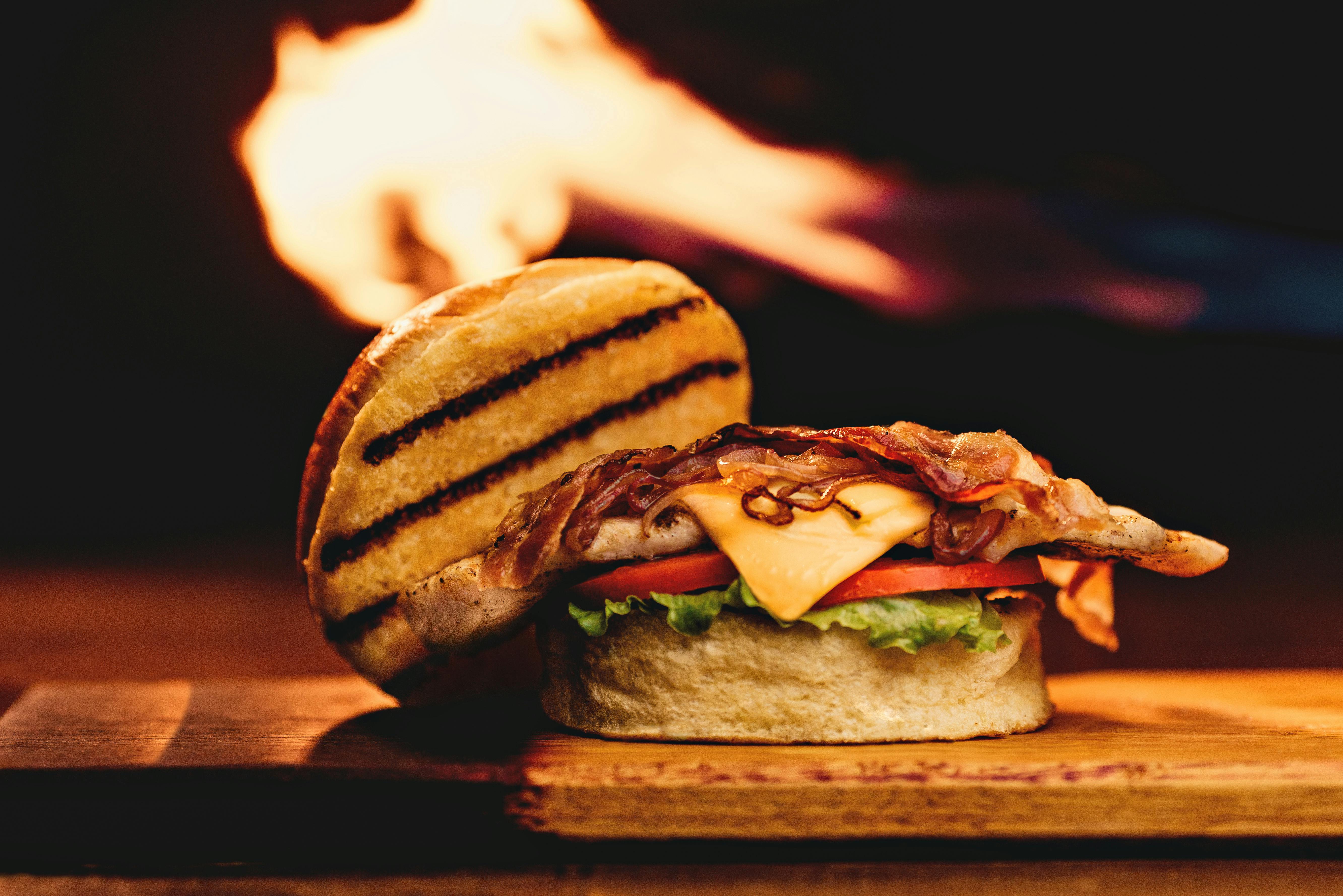 Classic cheeseburger with melted cheese and fresh vegetables